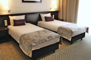 Фото номера Просторный двухместный номер с 2 отдельными кроватями Отель Hotel Toscania г. Włoszakowice 2